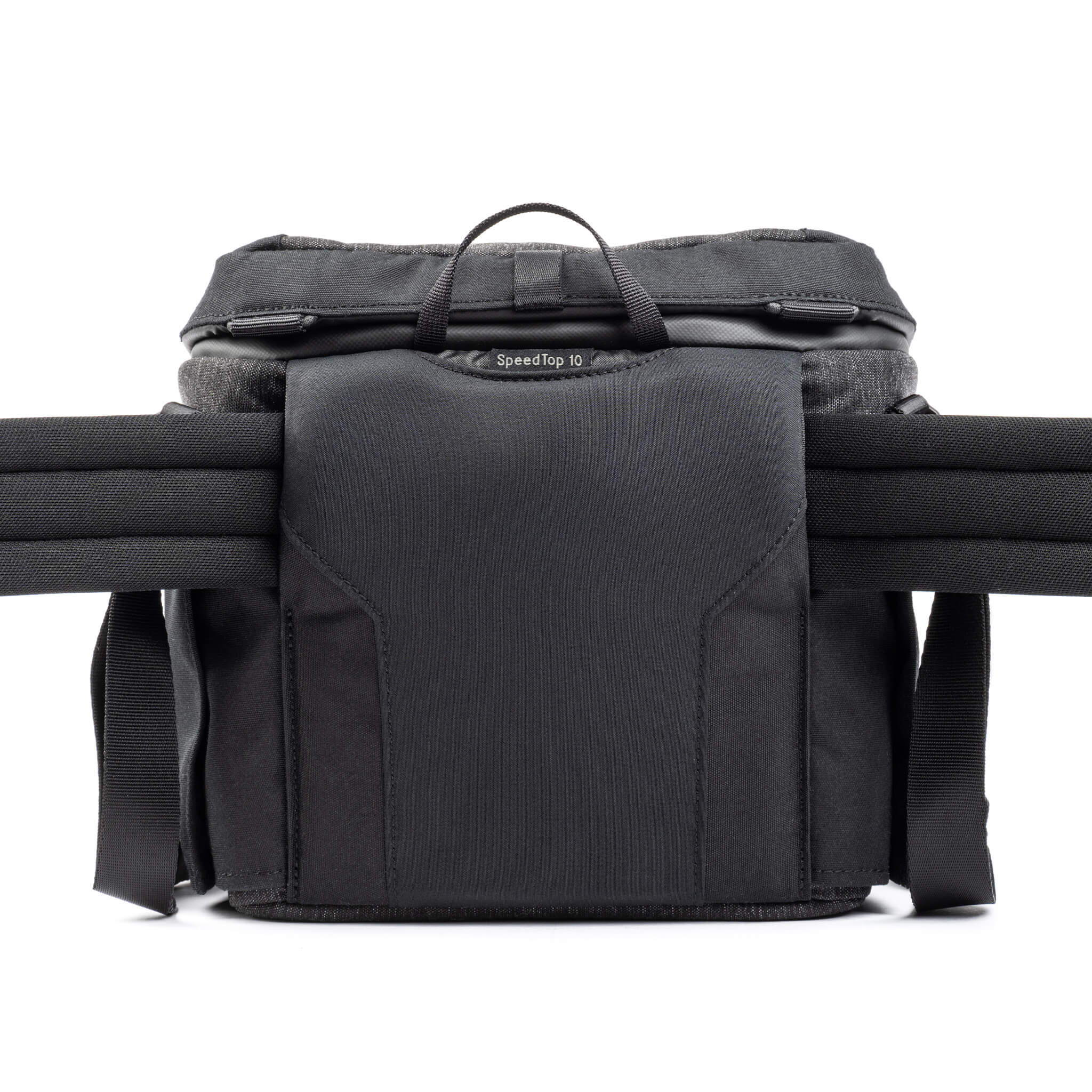 Think Tank SpeedTop 10 — compact crossbody camera bag with magnetic top lid and adjustable strap.