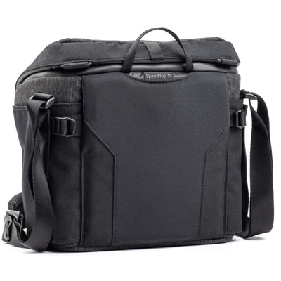 Think Tank SpeedTop 10 — compact crossbody camera bag with magnetic top lid and adjustable strap.