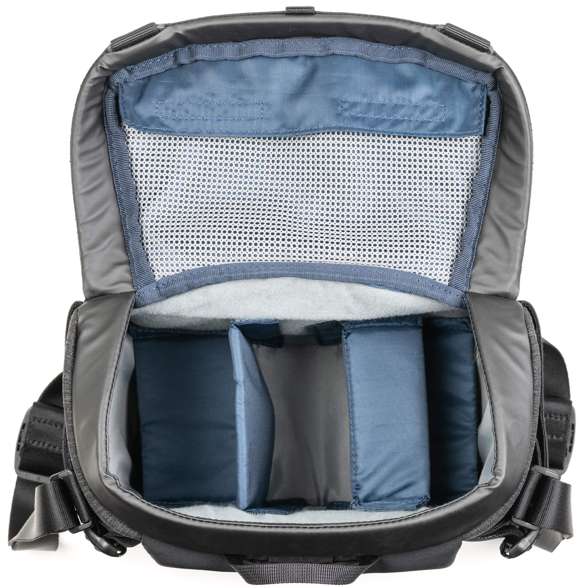 Think Tank SpeedTop 10 — compact crossbody camera bag with magnetic top lid and adjustable strap.