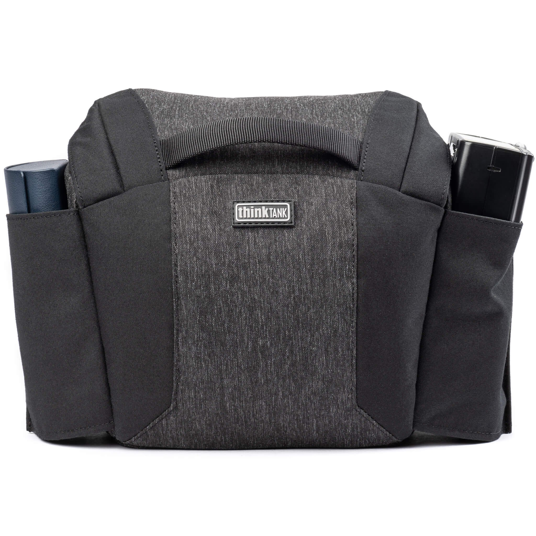 Think Tank SpeedTop 10 — compact crossbody camera bag with magnetic top lid and adjustable strap.
