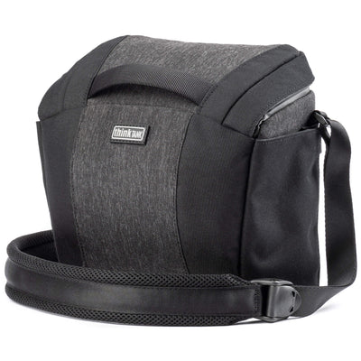 Think Tank SpeedTop 10 — compact crossbody camera bag with magnetic top lid and adjustable strap.