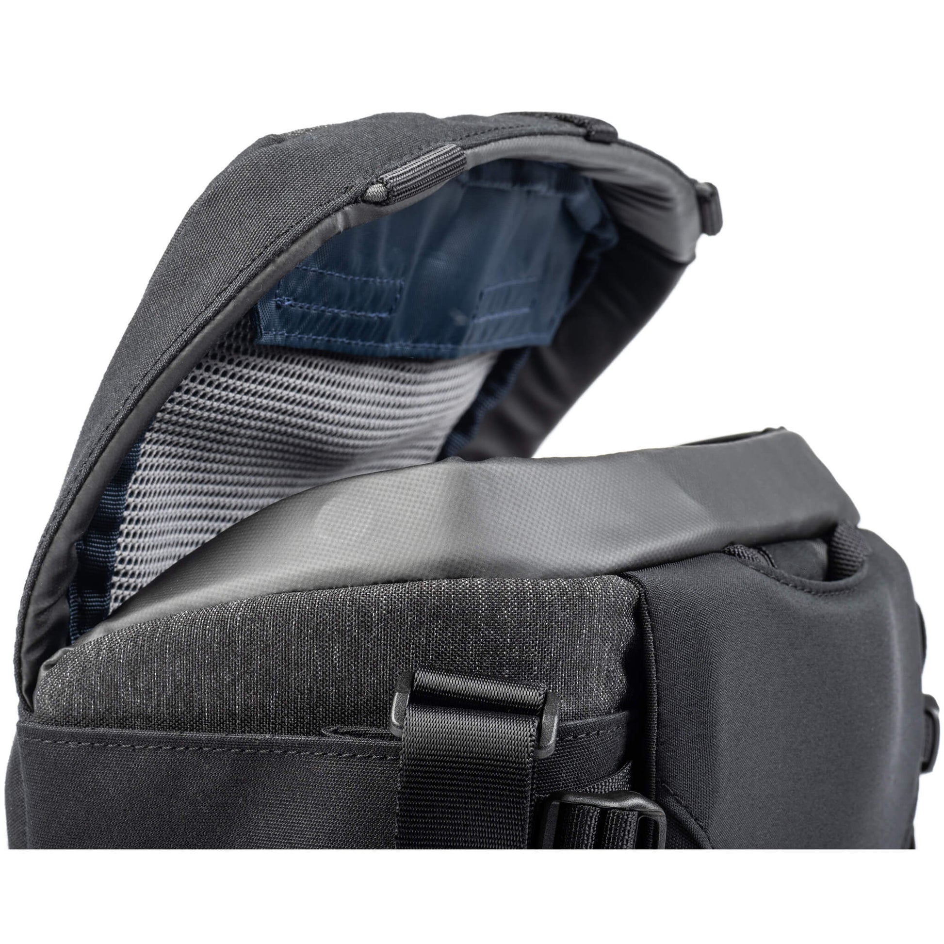 Think Tank SpeedTop 10 — compact crossbody camera bag with magnetic top lid and adjustable strap.