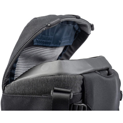 Think Tank SpeedTop 10 — compact crossbody camera bag with magnetic top lid and adjustable strap.