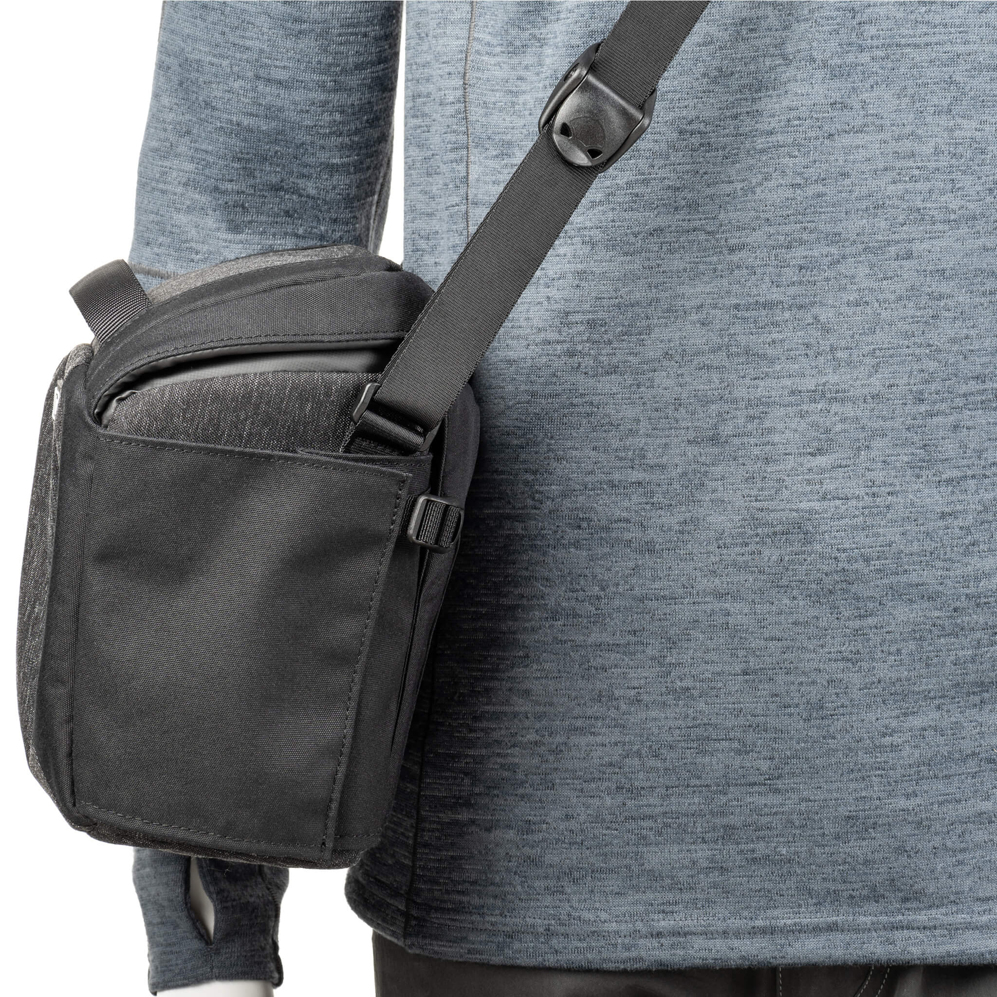 Think Tank SpeedTop 10 — compact crossbody camera bag with magnetic top lid and adjustable strap.