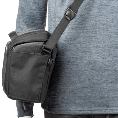 Think Tank SpeedTop 10 — compact crossbody camera bag with magnetic top lid and adjustable strap.