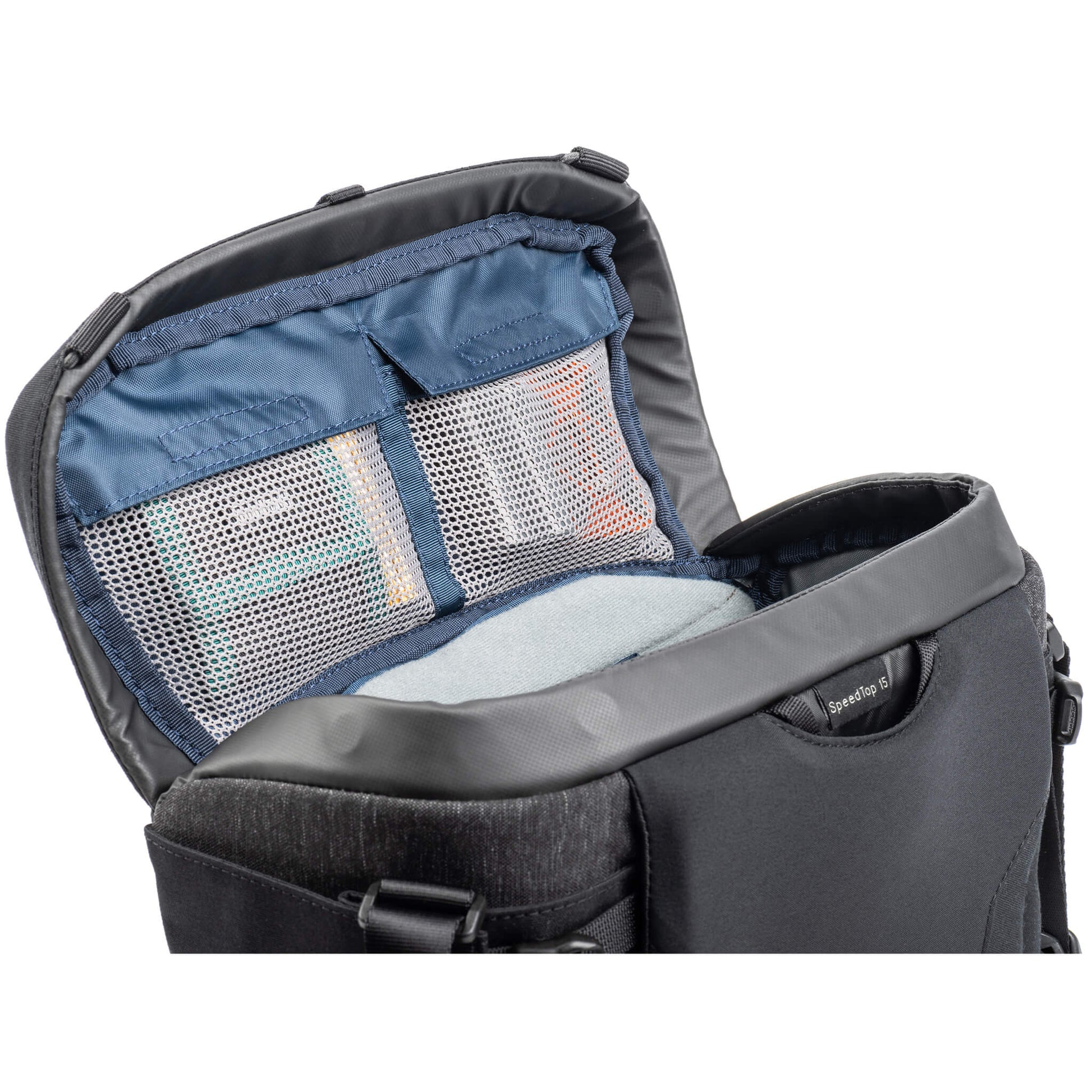 Think Tank SpeedTop 15 crossbody camera bag — compact sling bag with magnetic top lid for one-handed access