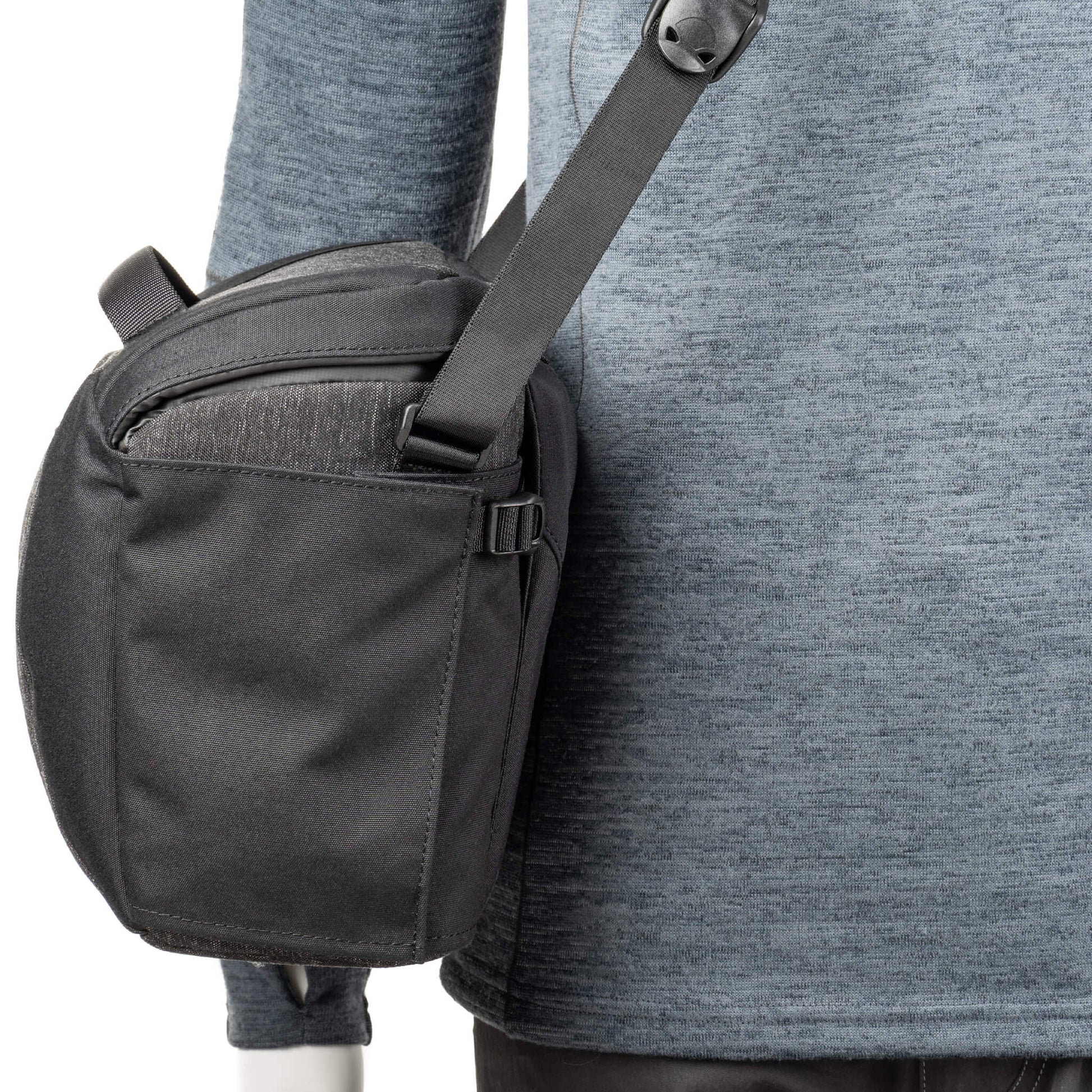 Think Tank SpeedTop 15 crossbody camera bag — compact sling bag with magnetic top lid for one-handed access