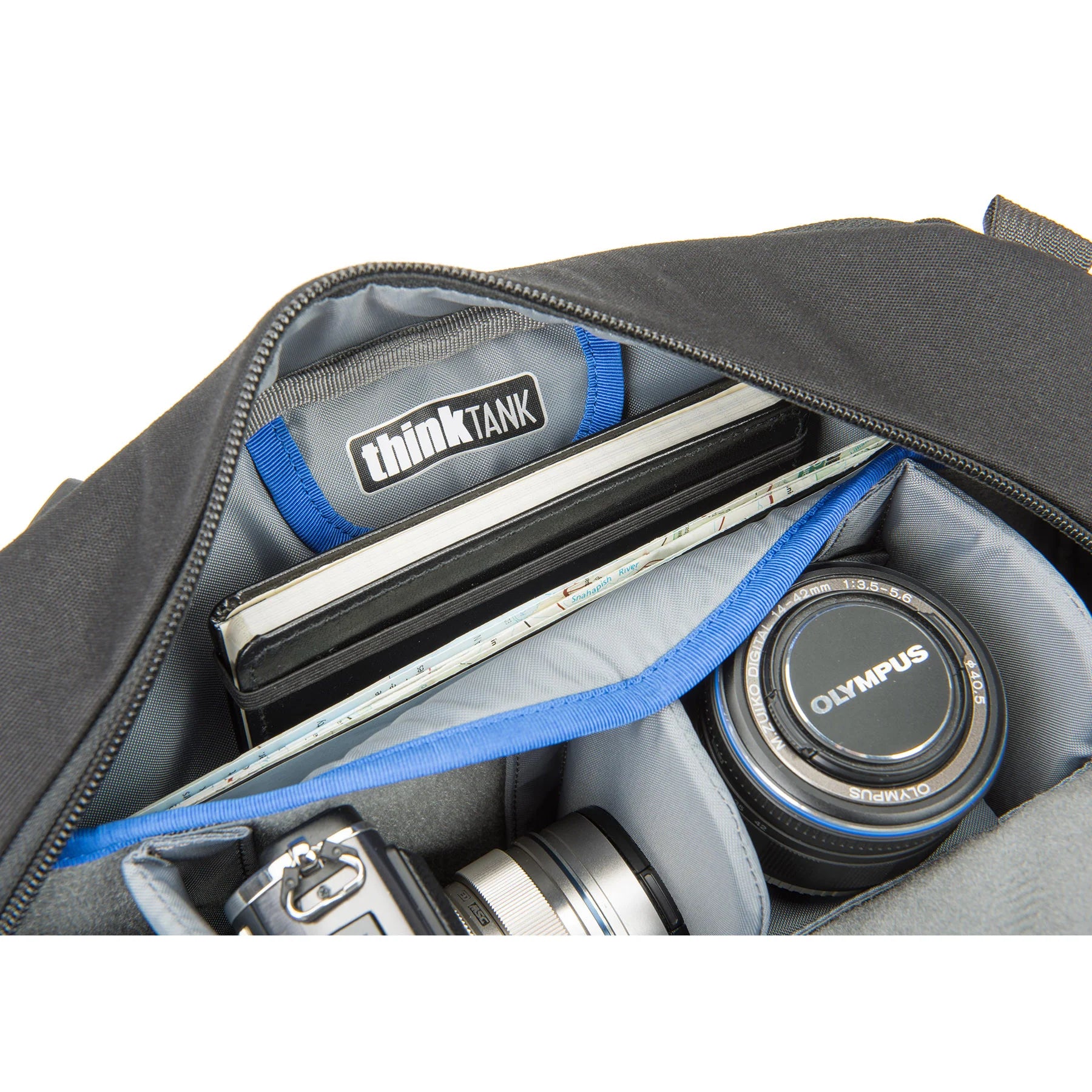 Think Tank TurnStyle 20 V2 sling bag — charcoal camera bag with contoured shoulder strap and side-rotation access for gear