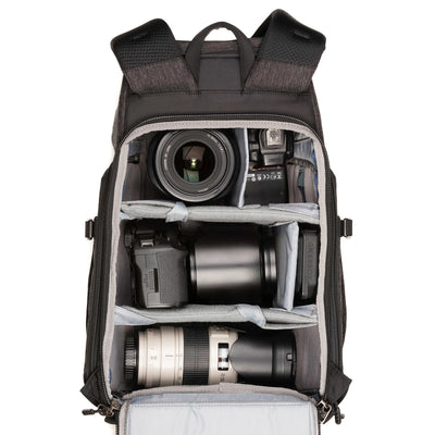 Think Tank Urban Access 13 backpack — stylish black daypack with side-access camera section and padded laptop compartment.