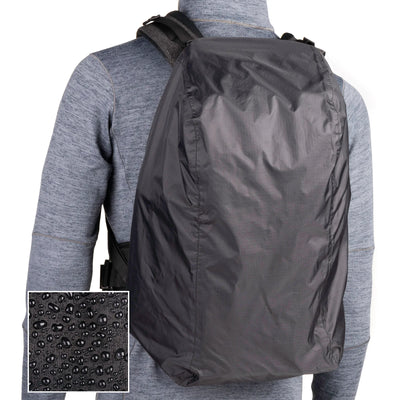 Think Tank Urban Access 13 backpack — stylish black daypack with side-access camera section and padded laptop compartment.
