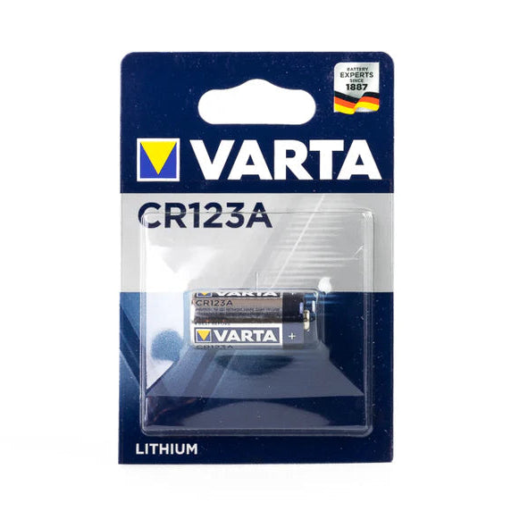 Varta CR123A 3V lithium battery standing upright on white background.