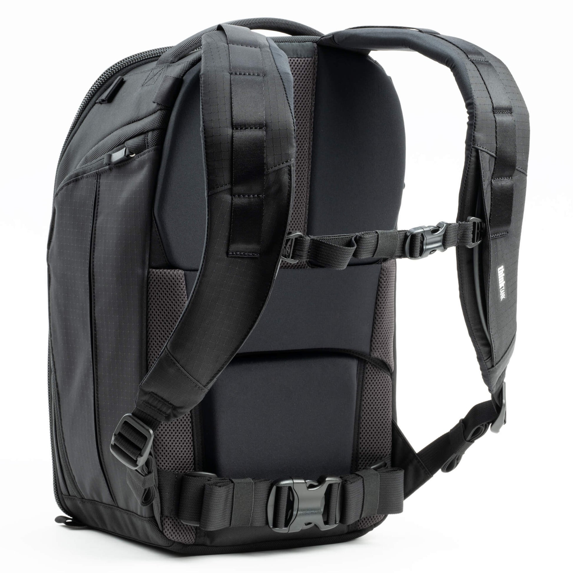 Think Tank Walker Pro 24L Backpack — a rugged camera backpack with top-access roll-top design, side access pockets, and customizable padded interior.