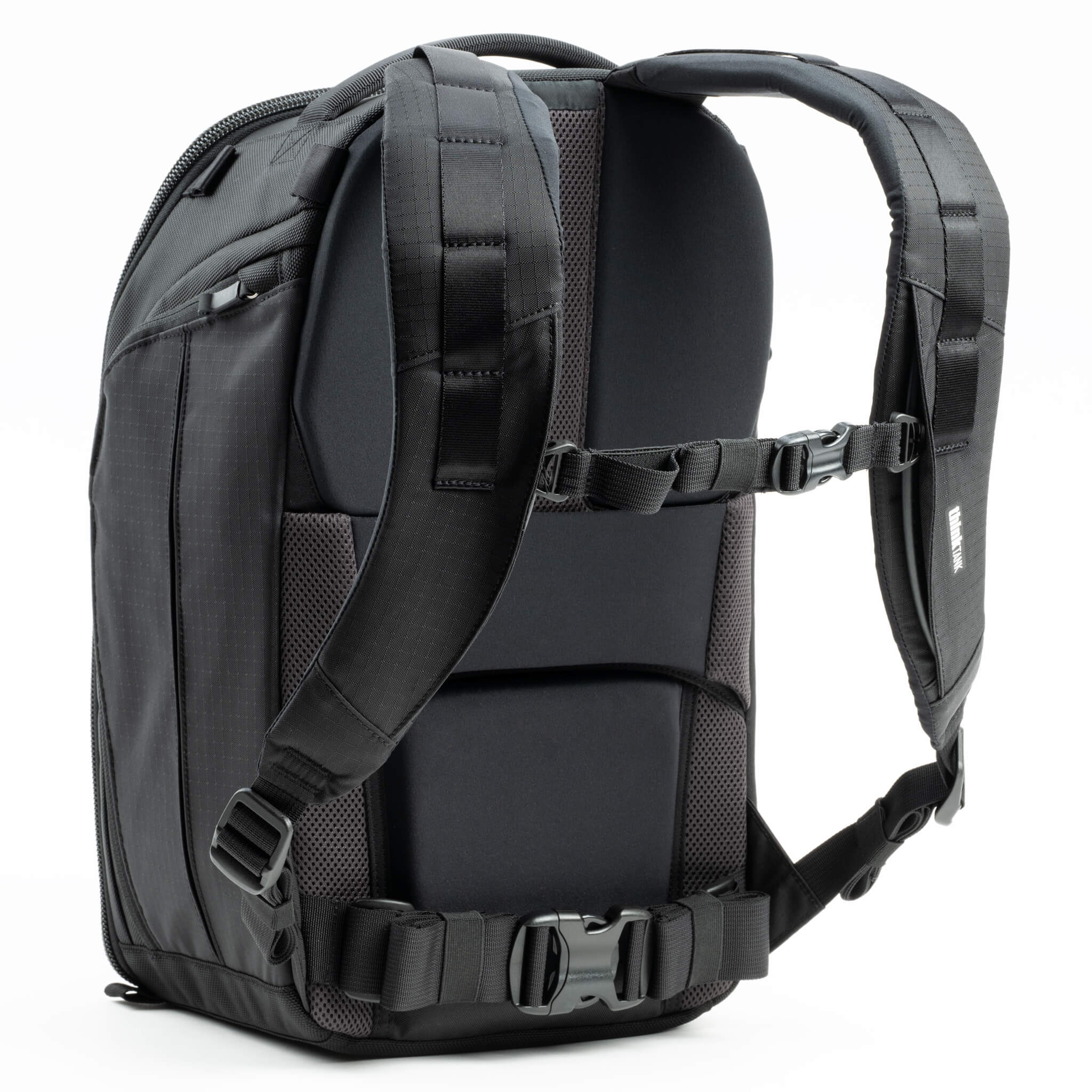 Think Tank Walker Pro 24L Backpack — a rugged camera backpack with top-access roll-top design, side access pockets, and customizable padded interior.