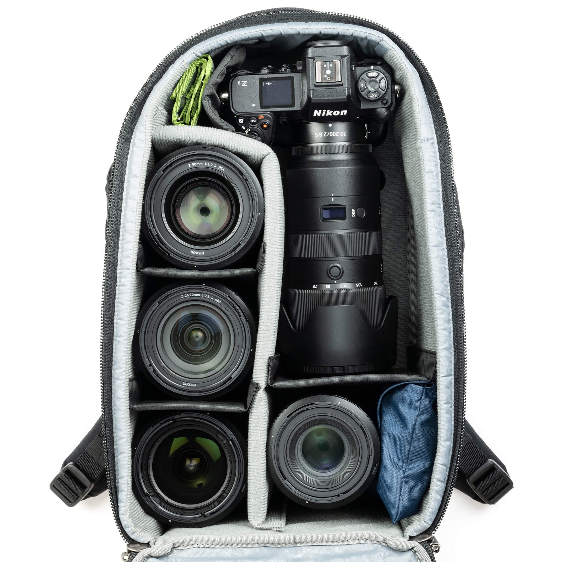 Think Tank Walker Pro 24L Backpack — a rugged camera backpack with top-access roll-top design, side access pockets, and customizable padded interior.