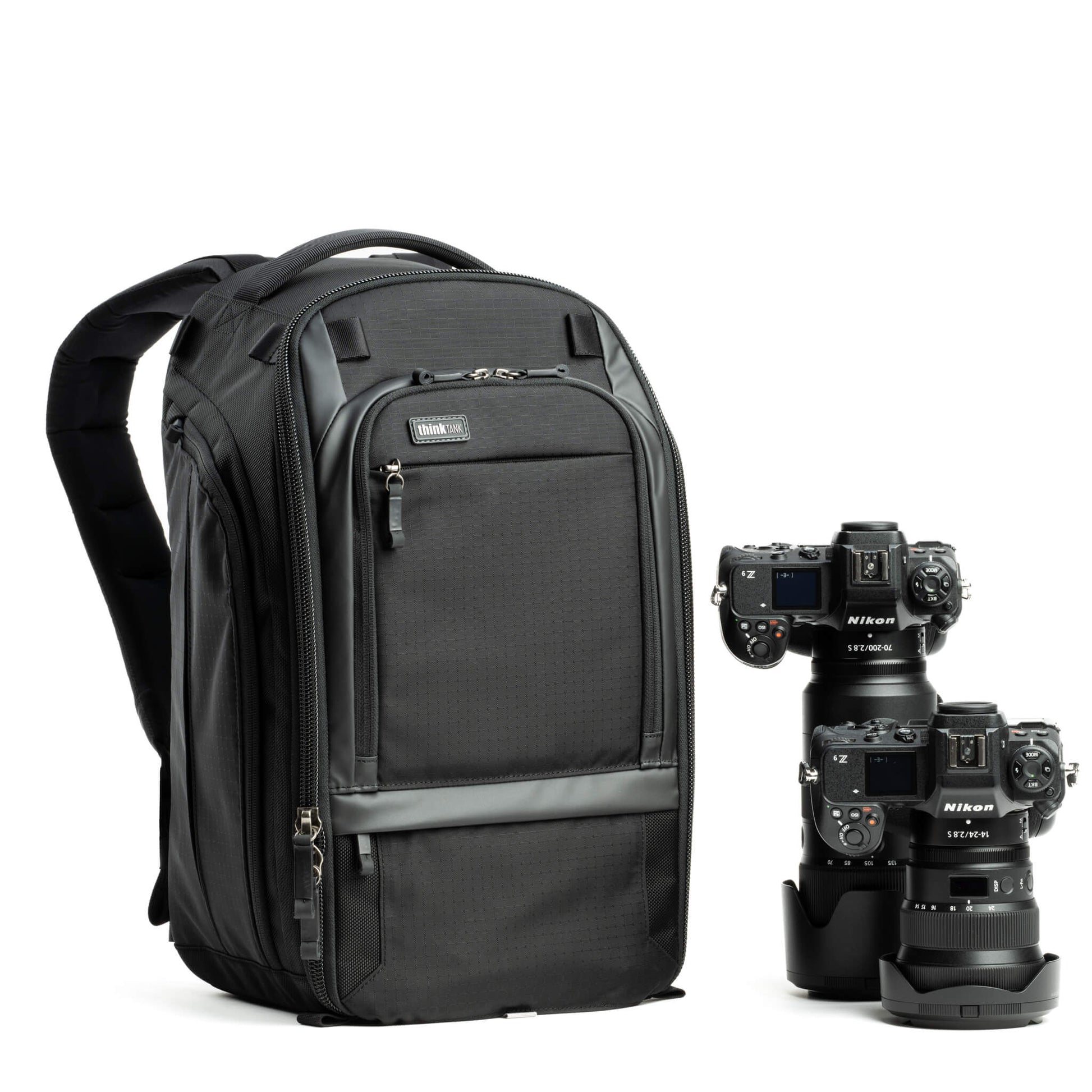Think Tank Walker Pro 24L Backpack — a rugged camera backpack with top-access roll-top design, side access pockets, and customizable padded interior.