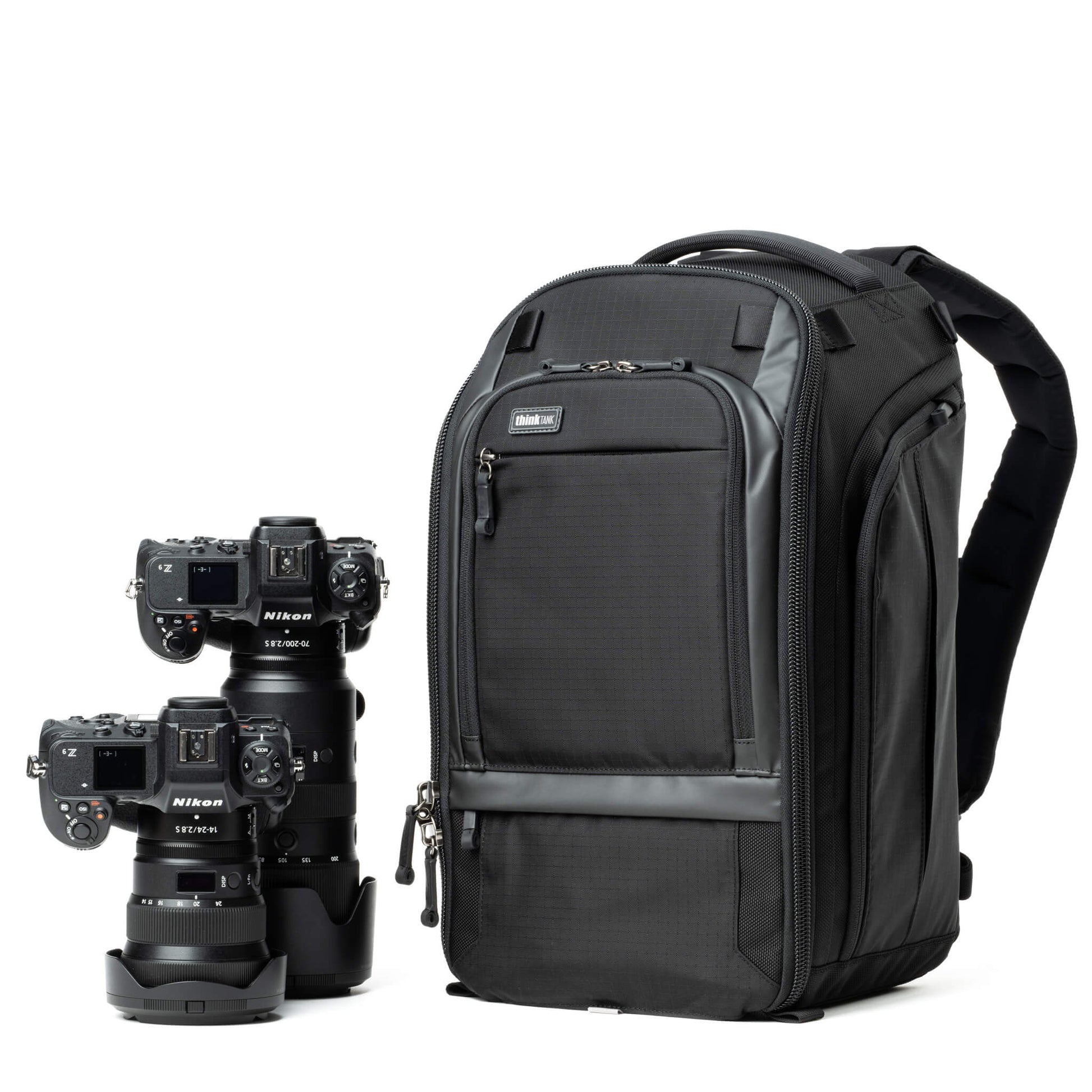 Think Tank Walker Pro 24L Backpack — a rugged camera backpack with top-access roll-top design, side access pockets, and customizable padded interior.