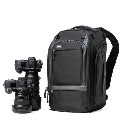 Think Tank Walker Pro 24L Backpack — a rugged camera backpack with top-access roll-top design, side access pockets, and customizable padded interior.