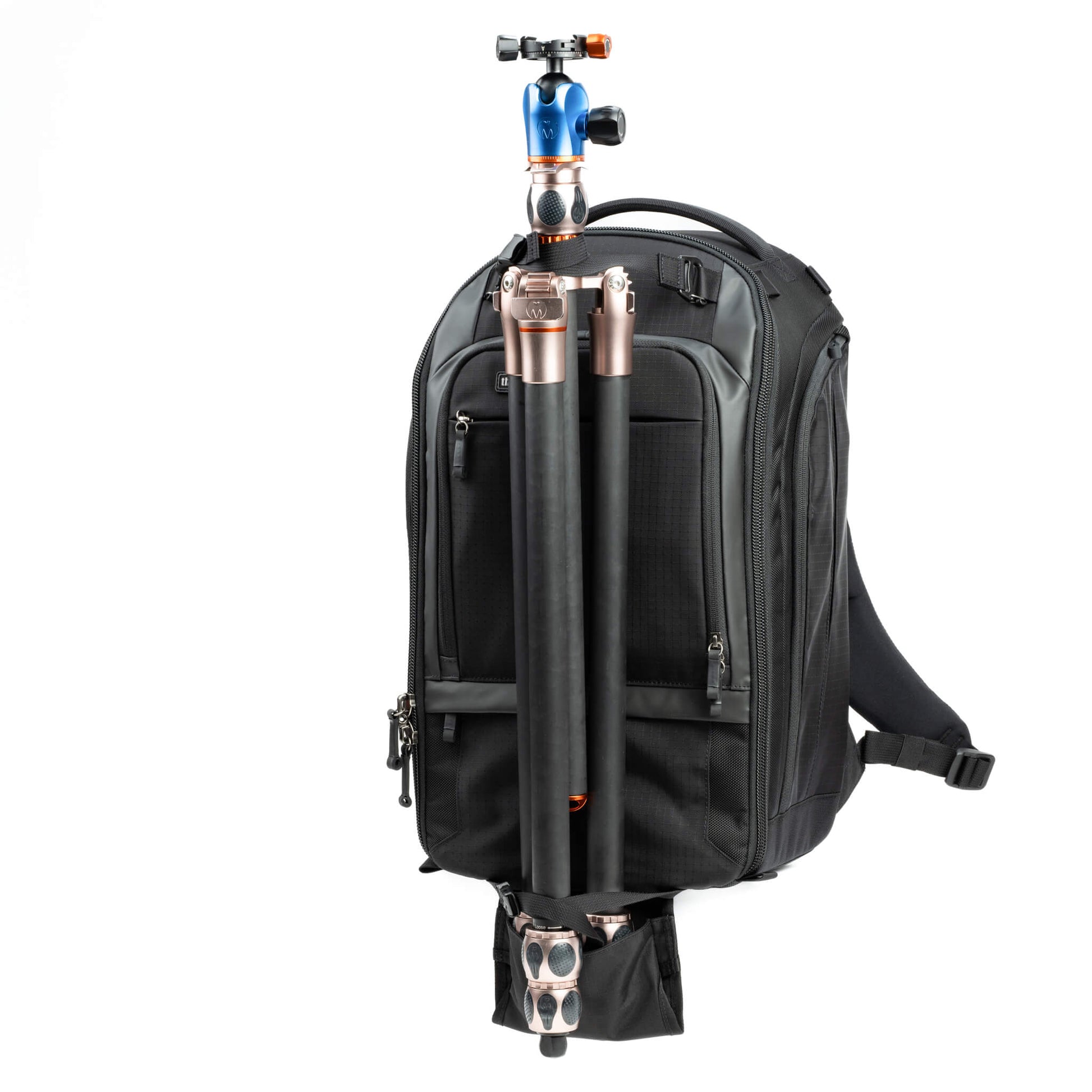 Think Tank Walker Pro backpack — rugged, roll-top camera pack in charcoal grey with side access pockets