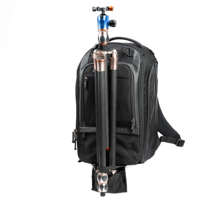 Think Tank Walker Pro backpack — rugged, roll-top camera pack in charcoal grey with side access pockets