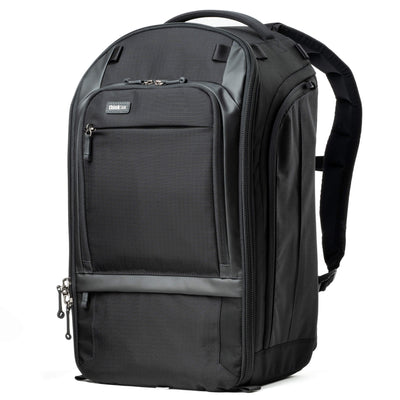 Think Tank Walker Pro backpack — rugged, roll-top camera pack in charcoal grey with side access pockets