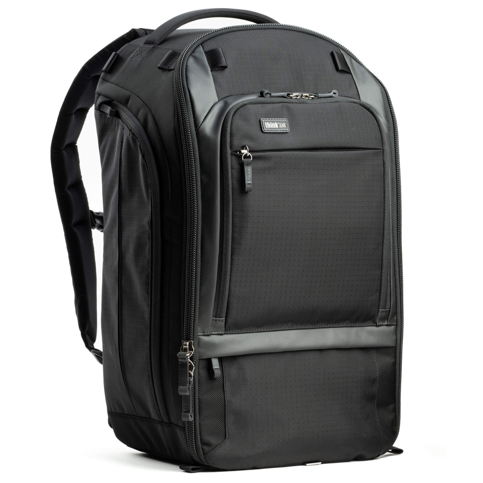 Think Tank Walker Pro backpack — rugged, roll-top camera pack in charcoal grey with side access pockets