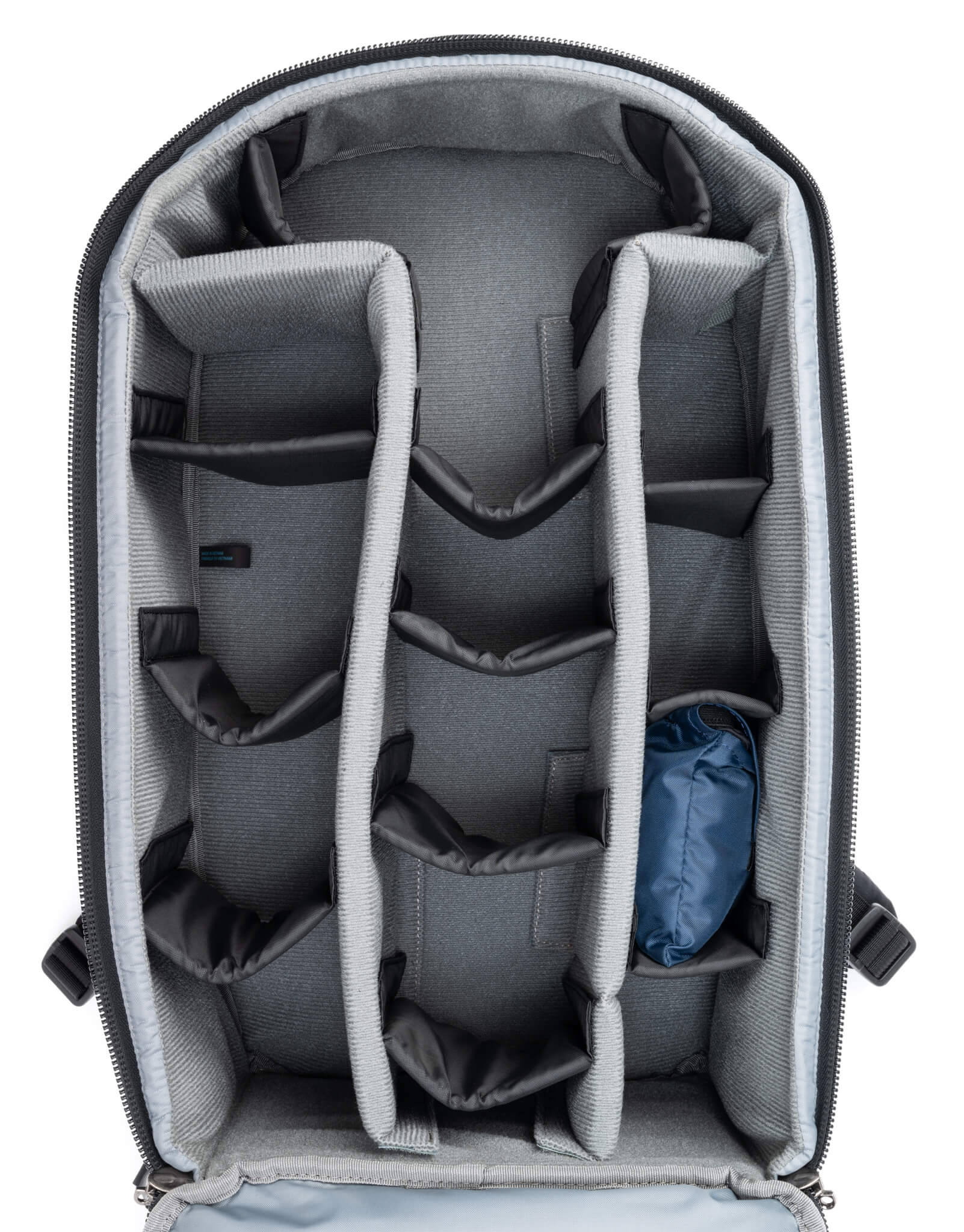 Think Tank Walker Pro backpack — rugged, roll-top camera pack in charcoal grey with side access pockets