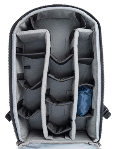 Think Tank Walker Pro backpack — rugged, roll-top camera pack in charcoal grey with side access pockets