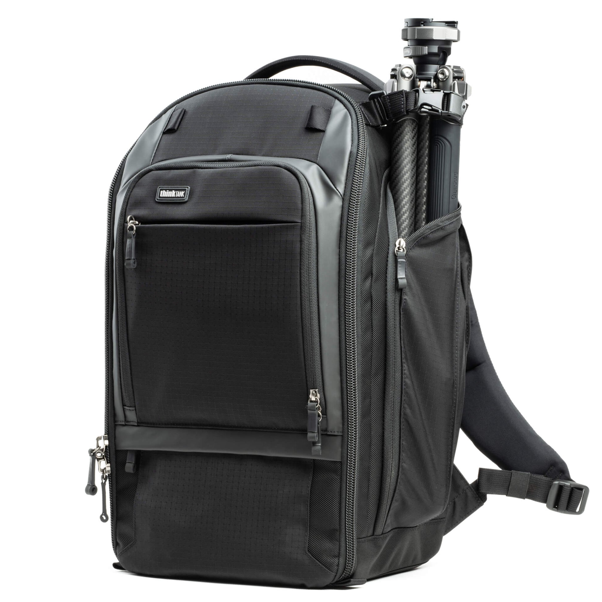 Think Tank Walker Pro backpack — rugged, roll-top camera pack in charcoal grey with side access pockets