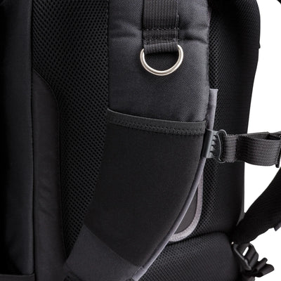 Think Tank Airport Accelerator camera backpack — black, large roll-top pack with padded dividers and side tripod mounts