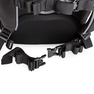 Think Tank Airport Commuter camera backpack — black carry-on bag with padded camera compartment, laptop sleeve, and side tripod straps.