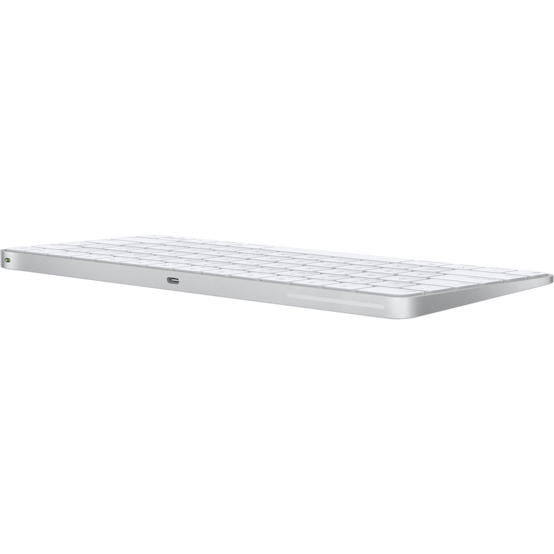 A sleek, low-profile Apple Magic Keyboard with a premium silver aluminum finish and minimalist white keys.
