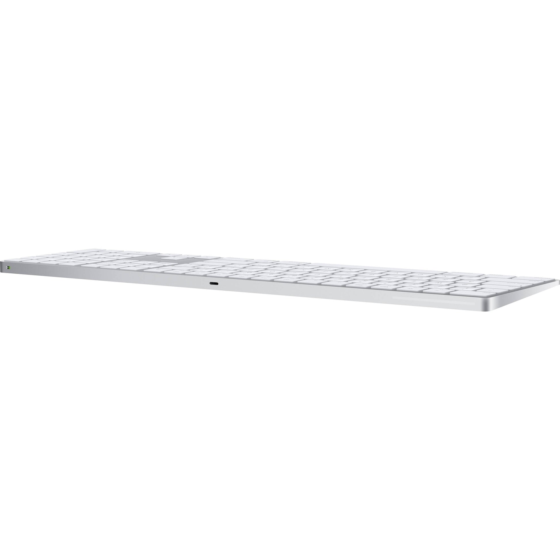 A sleek, low-profile Apple Magic Keyboard with a premium silver aluminum finish and minimalist white keys.