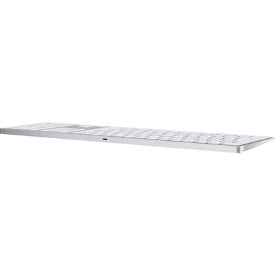 A sleek, low-profile Apple Magic Keyboard with a premium silver aluminum finish and minimalist white keys.