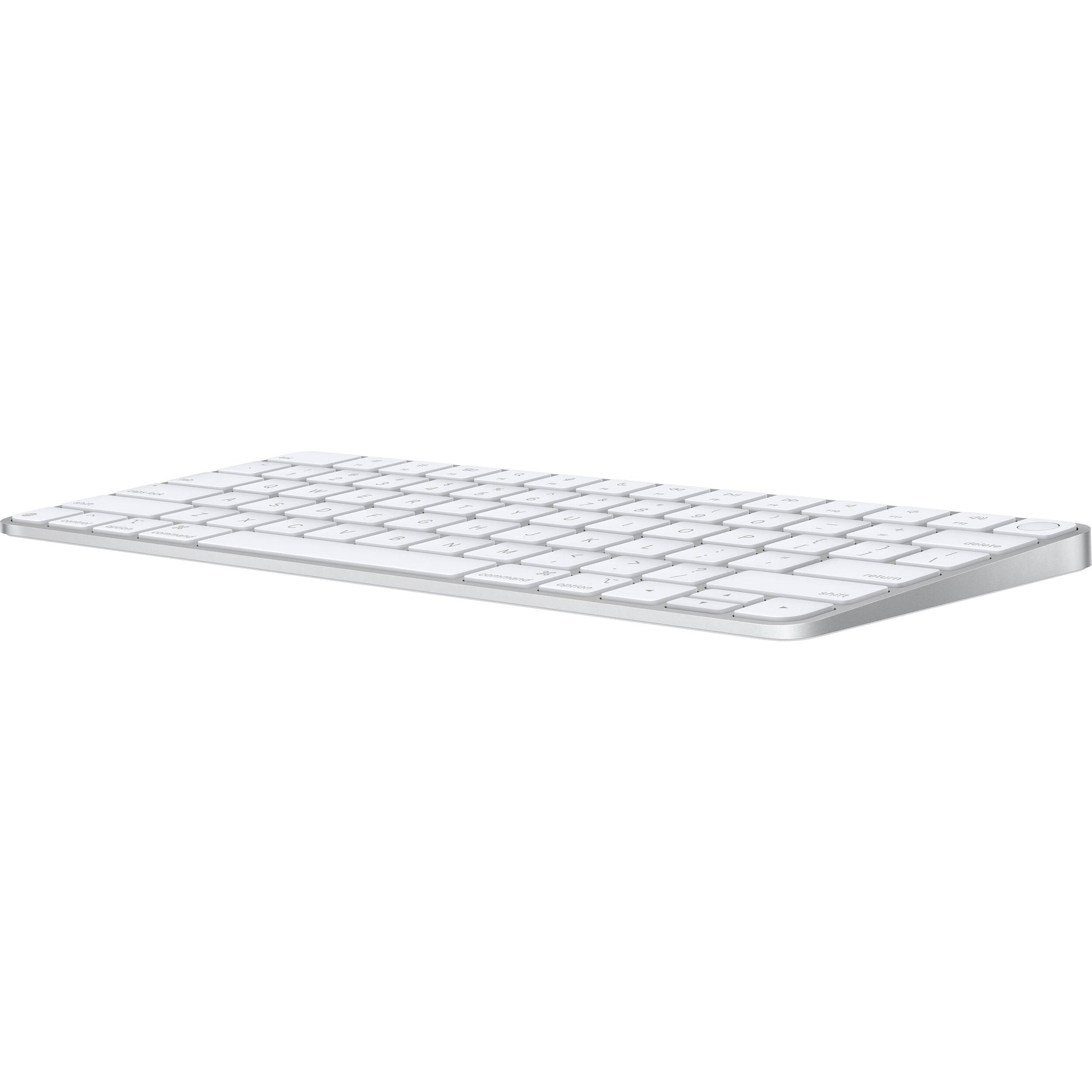 A sleek, low-profile Apple Magic Keyboard with a premium silver aluminum finish and minimalist white keys.