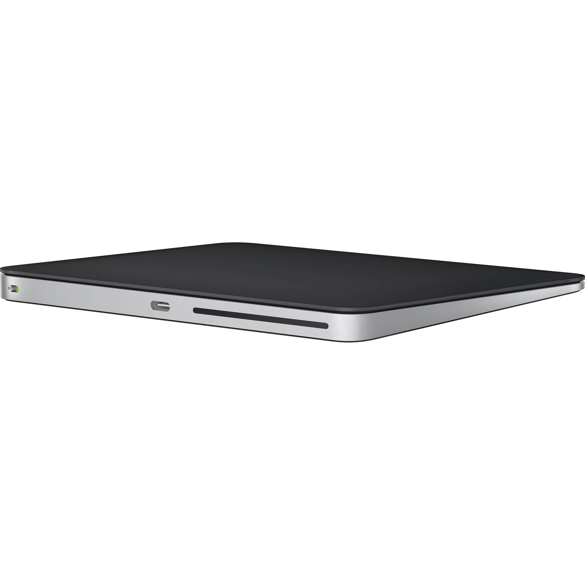Apple Magic Trackpad in Black with a smooth glass finish and USB-C charging port
