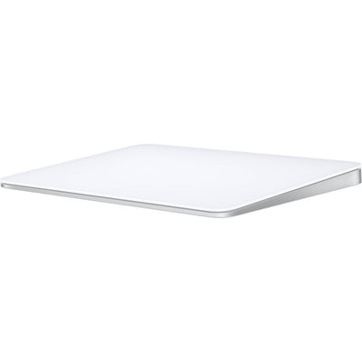 A sleek, white Apple Magic Trackpad with a large edge-to-edge glass surface and a low-profile ergonomic tilt, shown from a three-quarter perspective.
