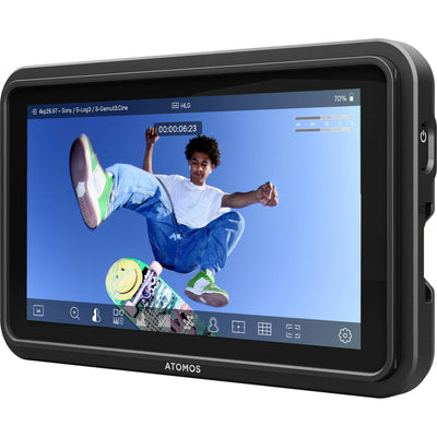 Display device with a screen showing a person on a skateboard, branded 'Atomos', on a light gray background
