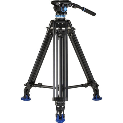 Black video tripod with a head on a white background
