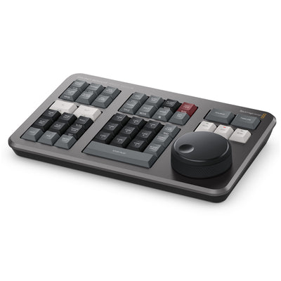 The DaVinci Resolve Speed Editor makes editing faster and easier with a tactile dial, source tape, live trimming, with wireless or USB connection.