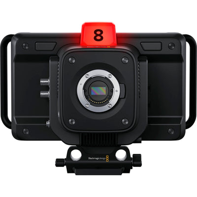Blackmagic Design Studio Camera 4K Plus G2 with MFT lens mount, 4K UHD 3840x2160 sensor, 25,600 ISO, 12G-SDI and HDMI outputs, 7" LCD viewfinder with sunshade, Blackmagic RAW recording, and built-in DaVinci Resolve colour correction.