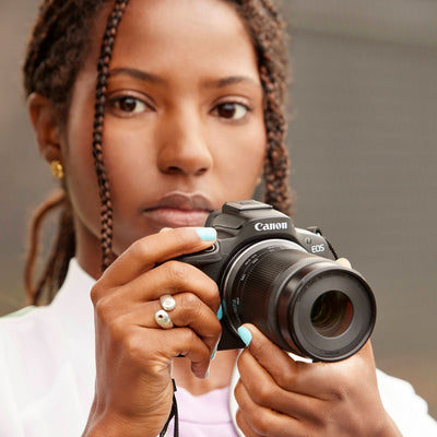 Canon EOS R50 mirrorless camera with 24MP sensor and 4K video.