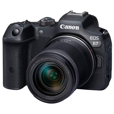 Canon EOS R7 Mirrorless Camera + RF-S 18-150mm Lens: 32.5MP APS-C sensor, DIGIC X processor, 4K 60p video (7K oversampled), 30fps burst, 7-stop IBIS, Dual Pixel CMOS AF II with AI tracking, RF-S 18-150mm f/3.5-6.3 IS STM lens with 4.5-stop stabilization included.