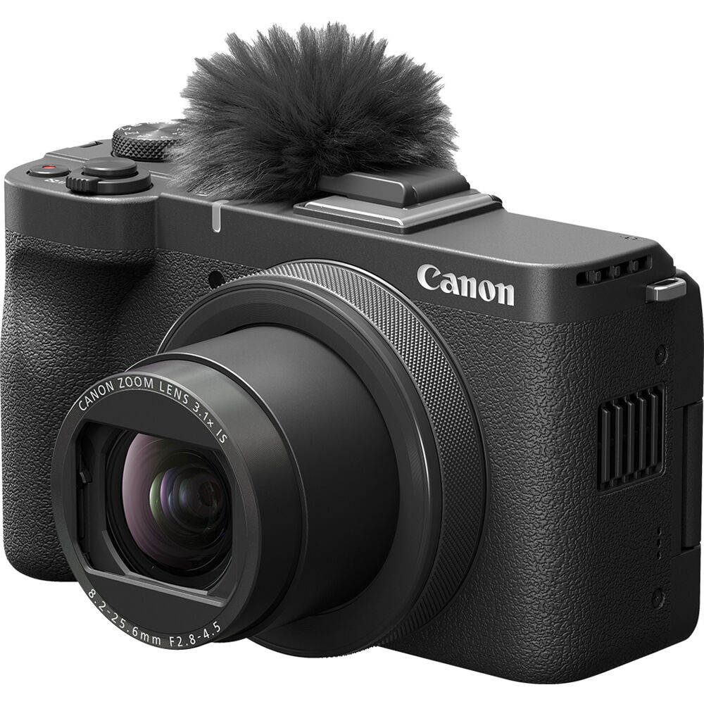 Canon PowerShot V1 Digital Camera: 22MP 1.4" CMOS sensor, 16-50mm f/2.8 lens, 4K 30p full-width and 4K 60p (1.4x crop) video, Dual Pixel CMOS AF II, built-in cooling, 3" vari-angle touchscreen, Canon Log 3, built-in ND filter, USB-C, mic input, headphone output, optical IS, up to 30fps burst.