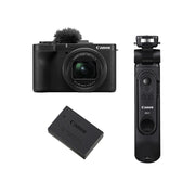Canon PowerShot V1 Premium Vlogger Kit: 22MP 1.4" CMOS sensor, 16-50mm f/2.8-4.5 lens, 4K 30p full-width and 4K 60p (1.4x crop) video, Dual Pixel CMOS AF II, built-in cooling fan, 3" vari-angle touchscreen, Canon Log 3, built-in ND filter, mic input, headphone output, Wi-Fi, USB-C, 32GB SD card, tripod grip, and windscreen included.