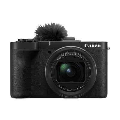 Canon PowerShot V1 Premium Vlogger Kit: 22MP 1.4" CMOS sensor, 16-50mm f/2.8-4.5 lens, 4K 30p full-width and 4K 60p (1.4x crop) video, Dual Pixel CMOS AF II, built-in cooling fan, 3" vari-angle touchscreen, Canon Log 3, built-in ND filter, mic input, headphone output, Wi-Fi, USB-C, 32GB SD card, tripod grip, and windscreen included.