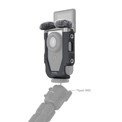 Canon PowerShot V10 Advanced Vlogging Kit (Silver): Compact 15MP 1" BSI CMOS sensor, fixed 19mm wide-angle lens, UHD 4K30p and Full HD 60p video, dual built-in stereo mics with wind filter, enhanced image stabilization, 2" tilting touchscreen, built-in stand, Wi-Fi & Bluetooth, camera cage kit included for accessory mounting and wind noise reduction.
