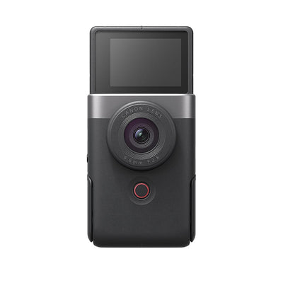 Canon PowerShot V10 Advanced Vlogging Kit (Silver): Compact 15MP 1" BSI CMOS sensor, fixed 19mm wide-angle lens, UHD 4K30p and Full HD 60p video, dual built-in stereo mics with wind filter, enhanced image stabilization, 2" tilting touchscreen, built-in stand, Wi-Fi & Bluetooth, camera cage kit included for accessory mounting and wind noise reduction.