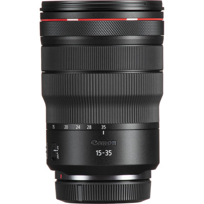 Canon camera lens with focus scale and brand logo on a white background