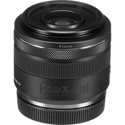 Black camera lens with 52mm filter thread on a white background