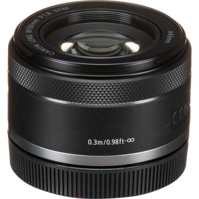 Compact Canon RF 50mm f/1.8 STM prime lens for mirrorless cameras, featuring a sleek black design and configurable control ring.